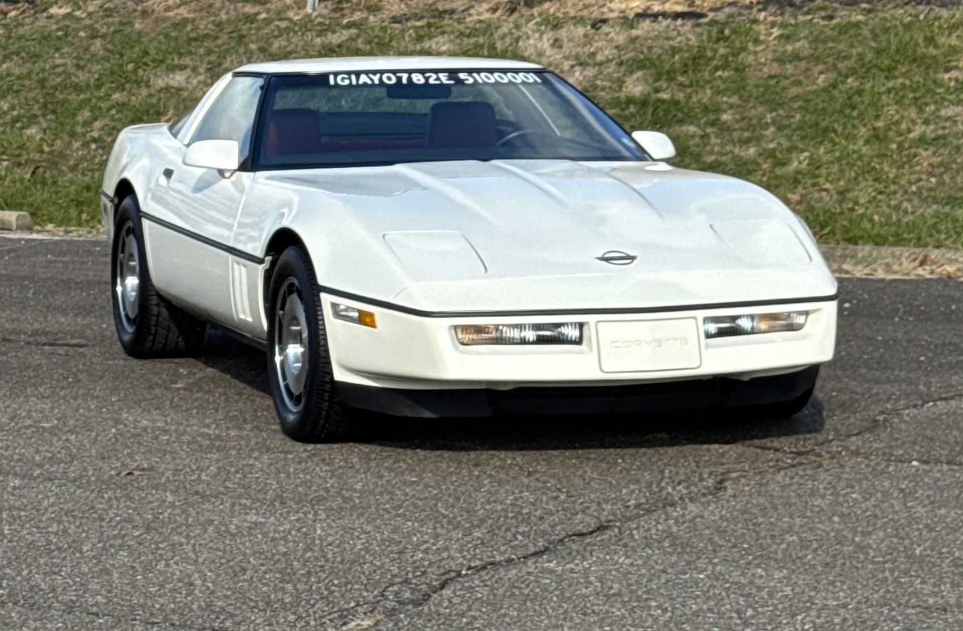 Front three-quarter view of the white 1984 Corvette