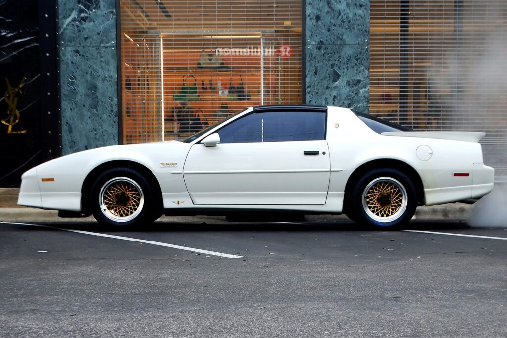 White 1989 Pontiac Turbo Trans Am 20th Anniversary with gold wheels