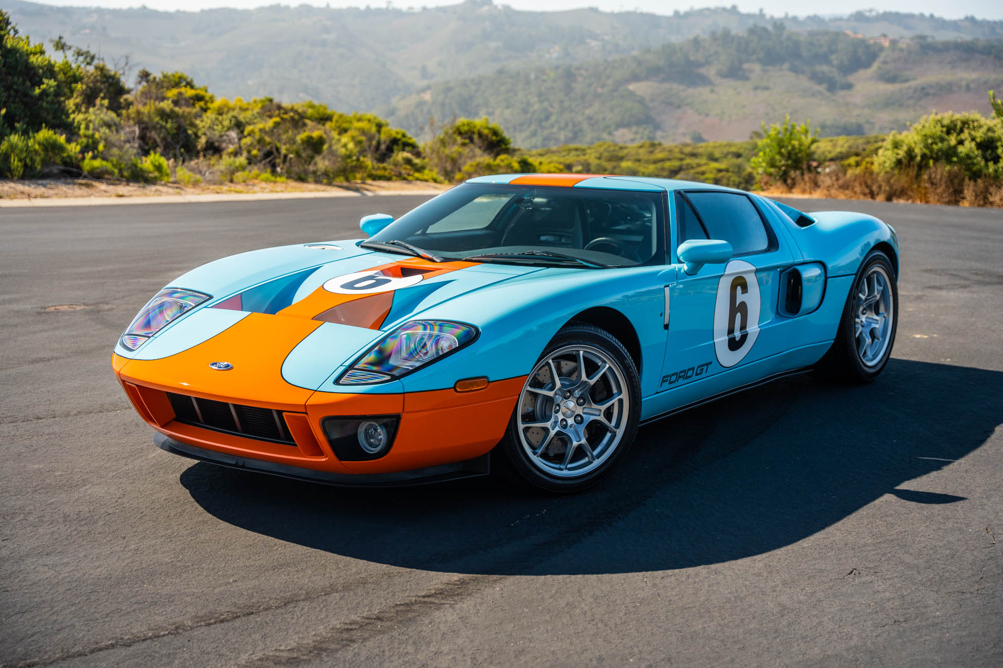 Low front view of the 2006 Ford GT Heritage Edition on the road