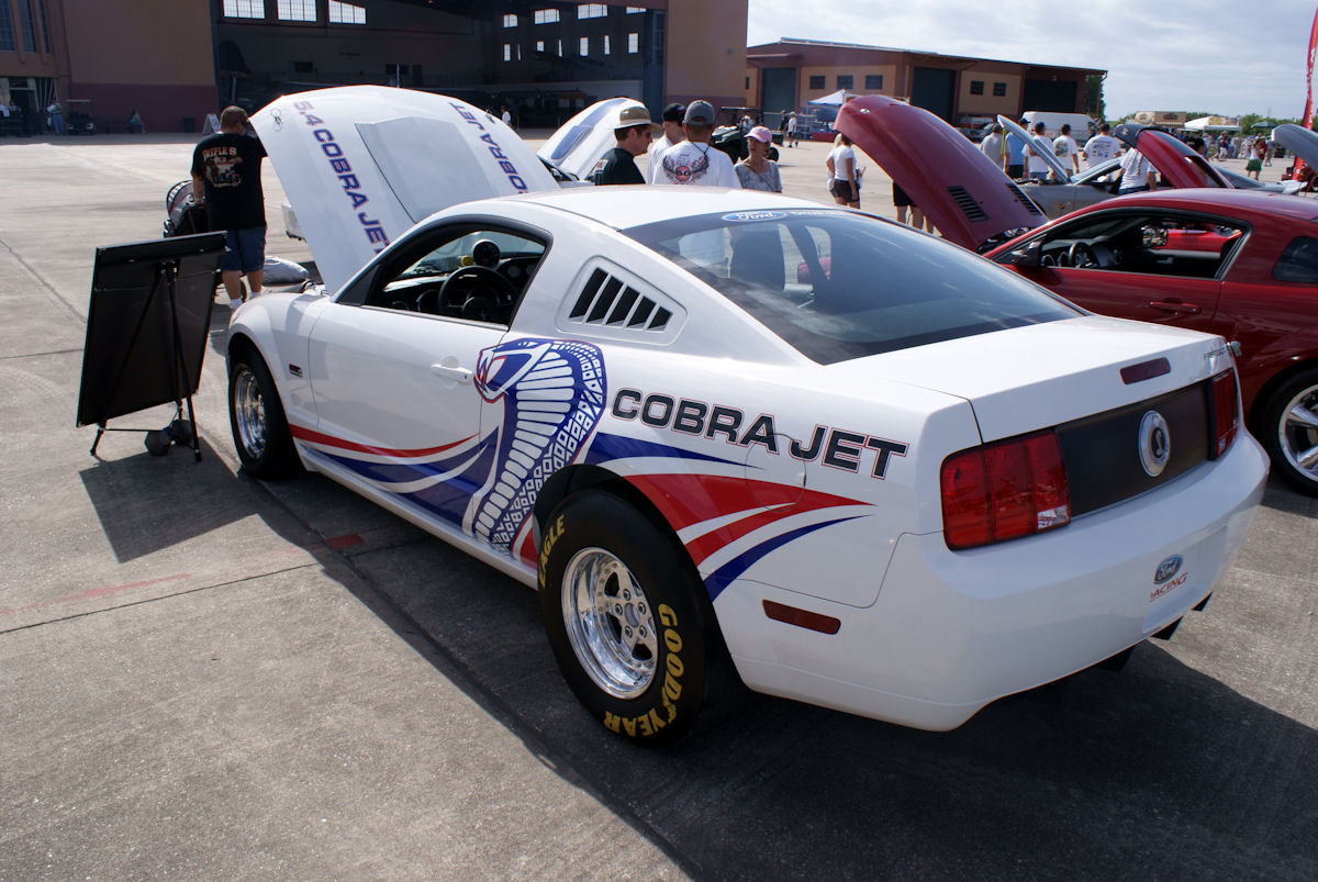 2008 Ford Racing Mustang Cobra Jet drag car, rear three-quarter view