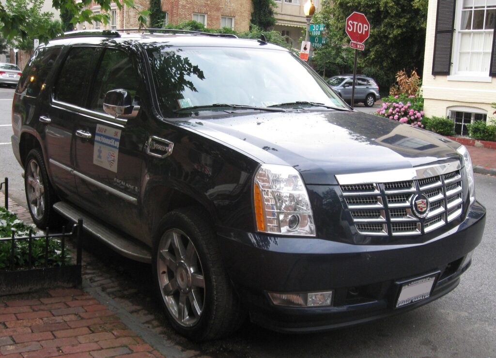 A black 2009 Cadillac Escalade Hybrid SUV