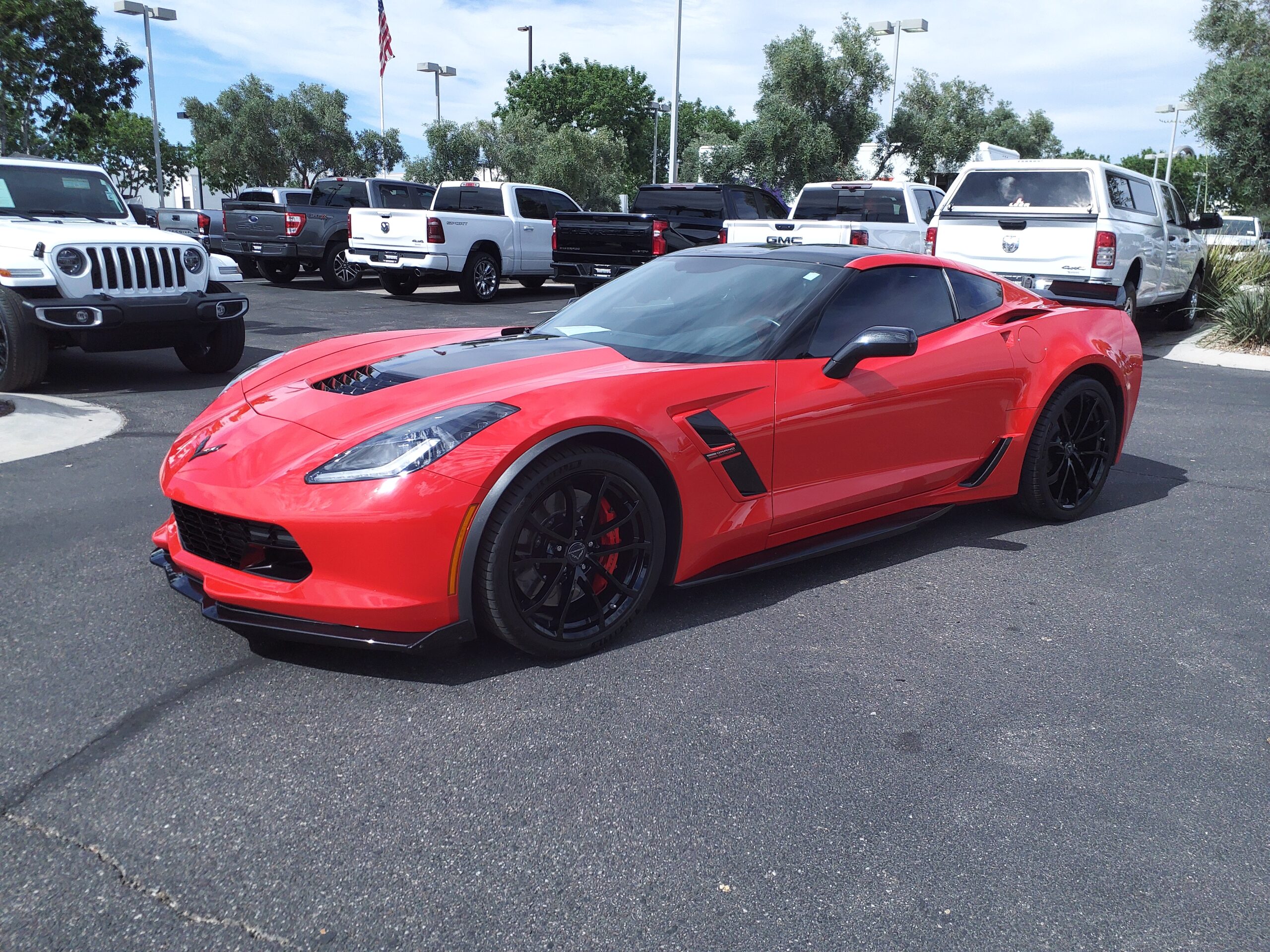 Red 2019 Chevrolet Corvette Grand Sport C7 coupe parked in a lot