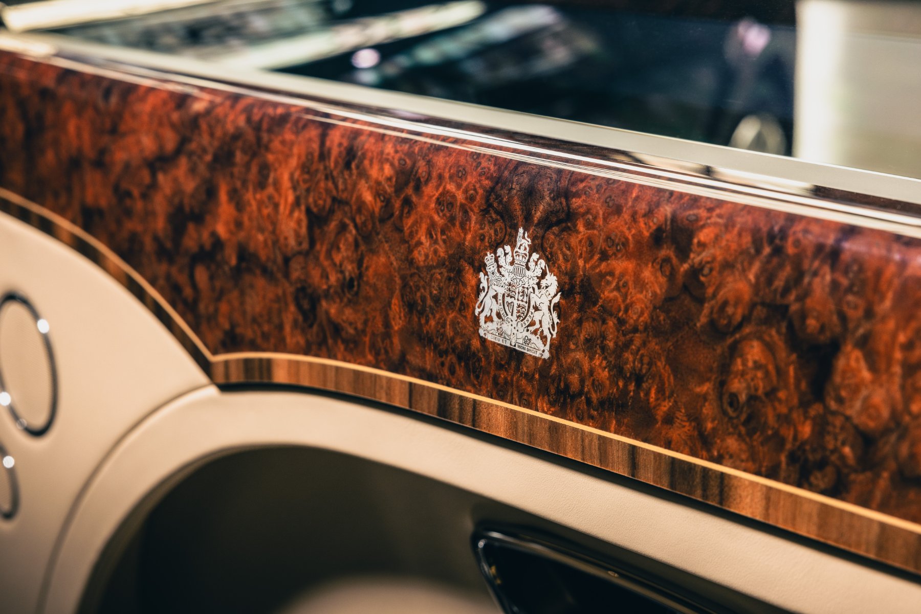 Royal coat of arms inlaid in the Burr Walnut door waistrail of the 2020 Bentley Mulsanne built for Queen Elizabeth II