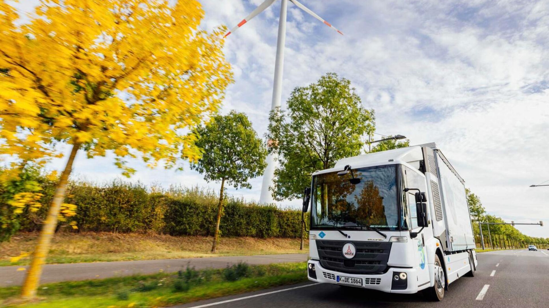 BMW's HyCET hydrogen combustion truck with DEUTZ engine driving on a road near Plant Leipzig