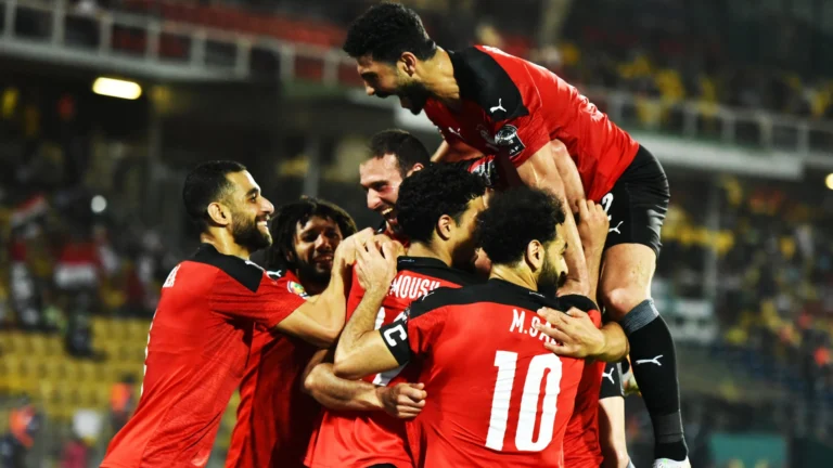 Omar Marmoush celebrating with Egypt teammates