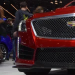 Front three-quarter view of a 2016 Cadillac CTS-V sedan on display at the New York Auto Show