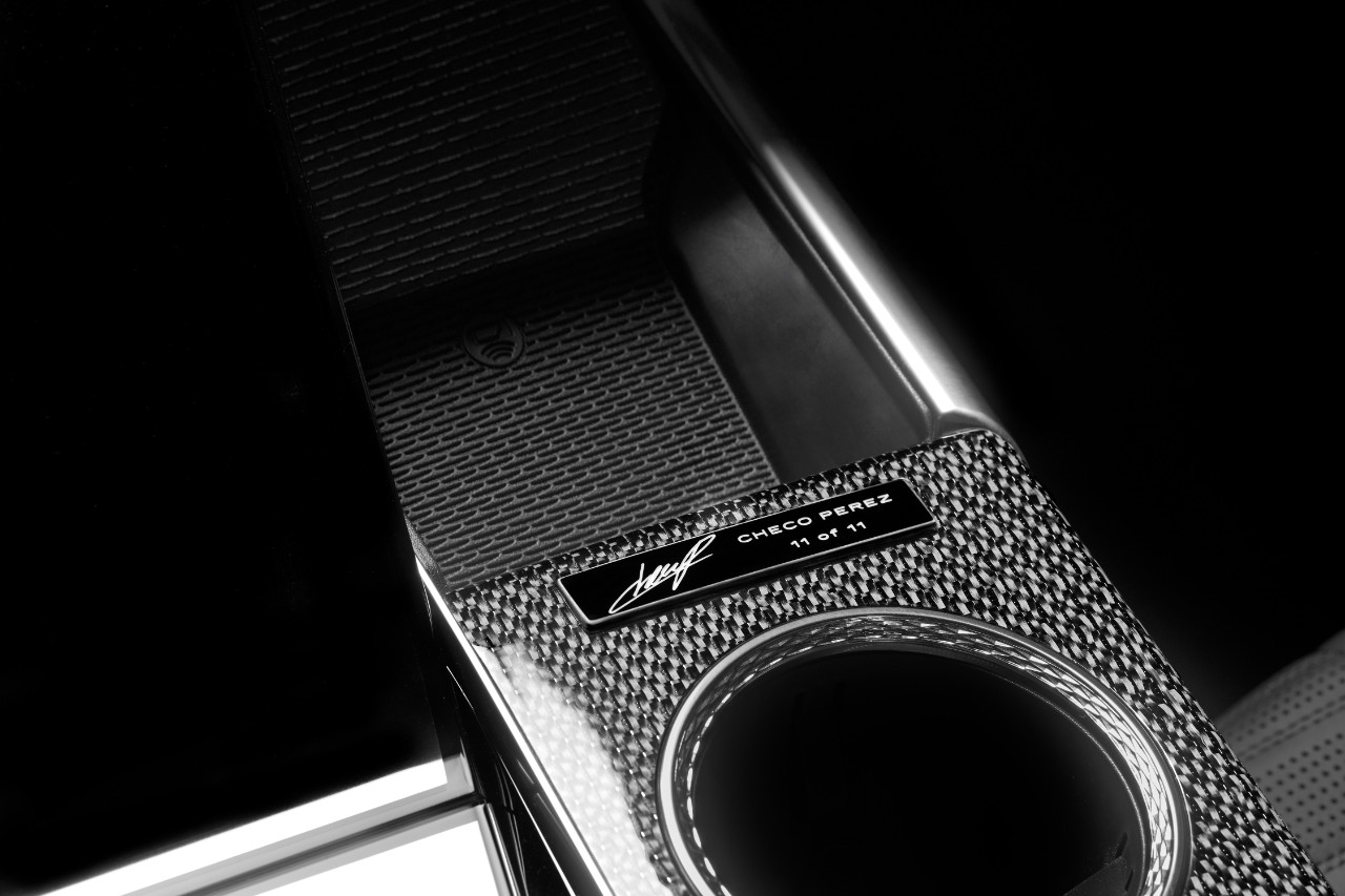 Signed Checo Perez 11 of 11 plaque on the carbon-fiber center console of the Cadillac Escalade-V Edici&oacute;n Checo P&eacute;rez