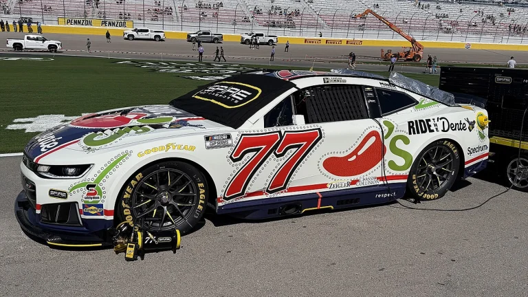 Carson Hocevar's No. 77 Spire Motorsports Chevrolet parked on the grid at Las Vegas Motor Speedway