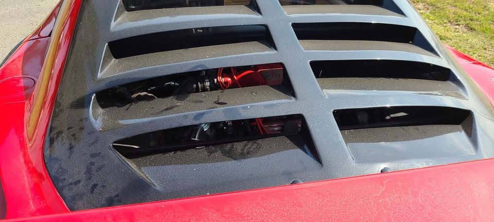 Louvered engine cover of the F40 kit car showing the Fiero V6 underneath