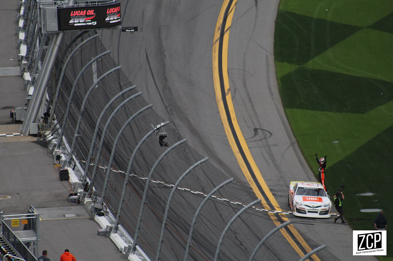 Corey Heim celebrating in the No. 20 JBL Toyota after the 2021 ARCA Menards Series race at Daytona