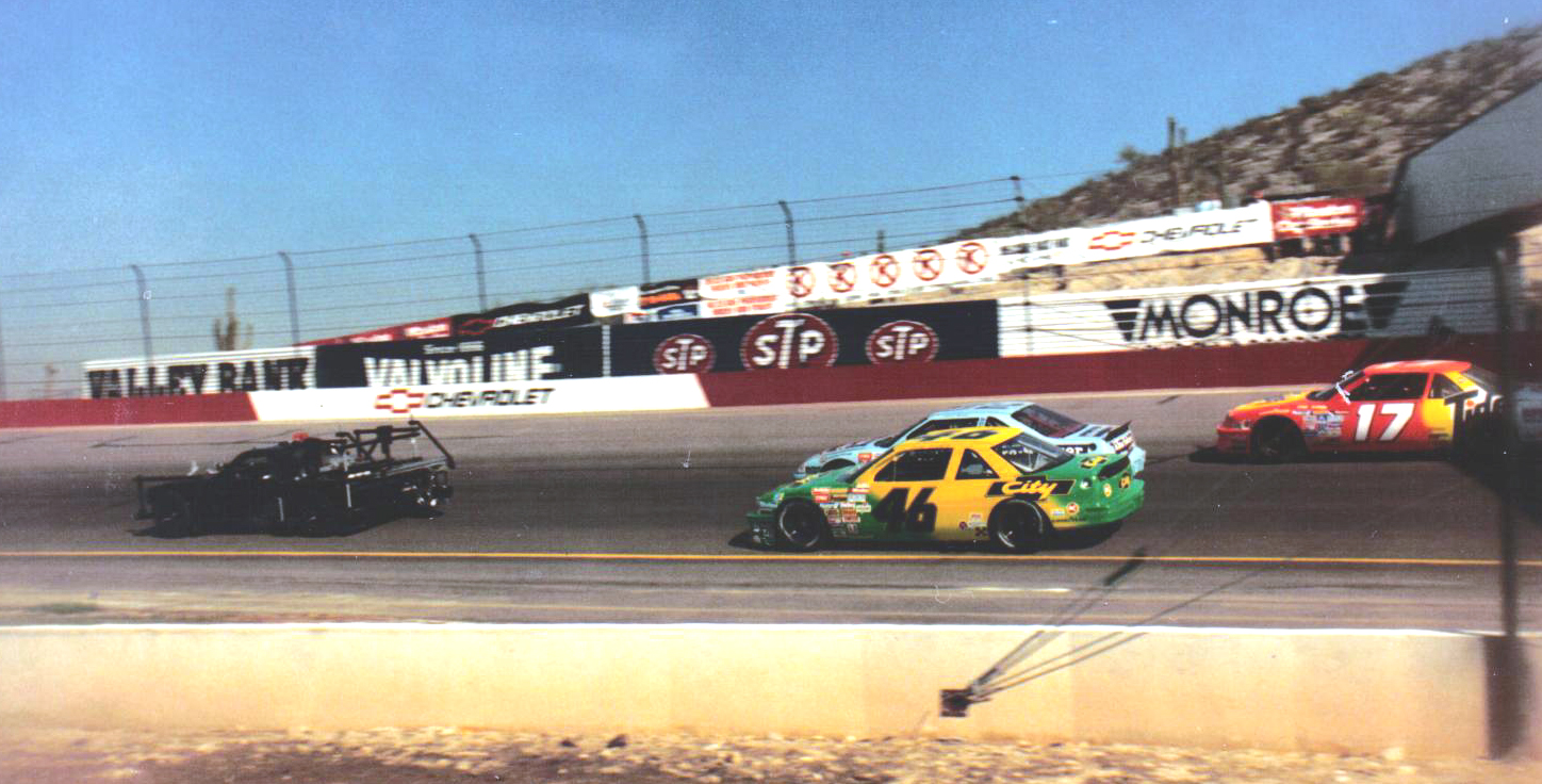 A camera vehicle leads the No. 46 Days of Thunder car on track during filming