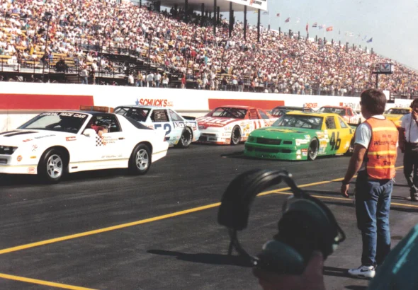 Stock cars on track at Phoenix International Raceway during filming of Days of Thunder in 1989
