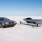 DeLorean DMC-12 beside a DeLorean-liveried Airspeeder aircraft