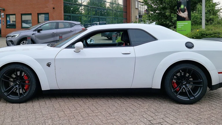 White Dodge Challenger SRT in side profile