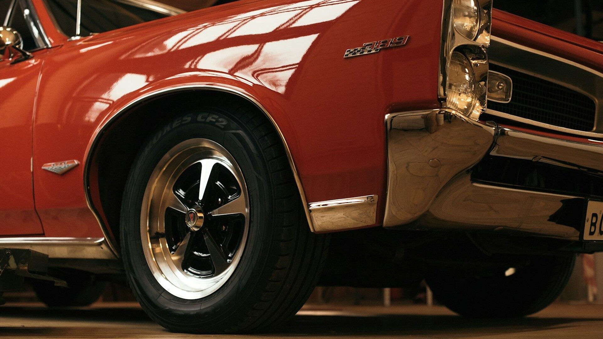 red and white car in a parking lot