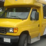 Ford E-Series cutaway chassis fitted with a shuttle bus body