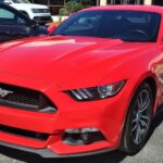Ford Mustang GT fastback parked outdoors, front three-quarter view