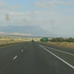 Interstate 84 near La Grande, Oregon, with trucks on the highway