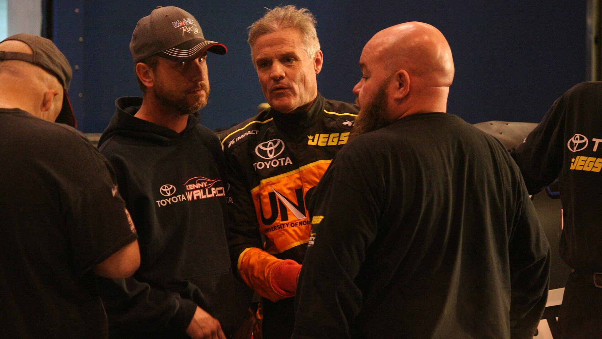 Kenny Wallace in a yellow driver suit at the Gateway Dirt Nationals in St. Louis, 2018