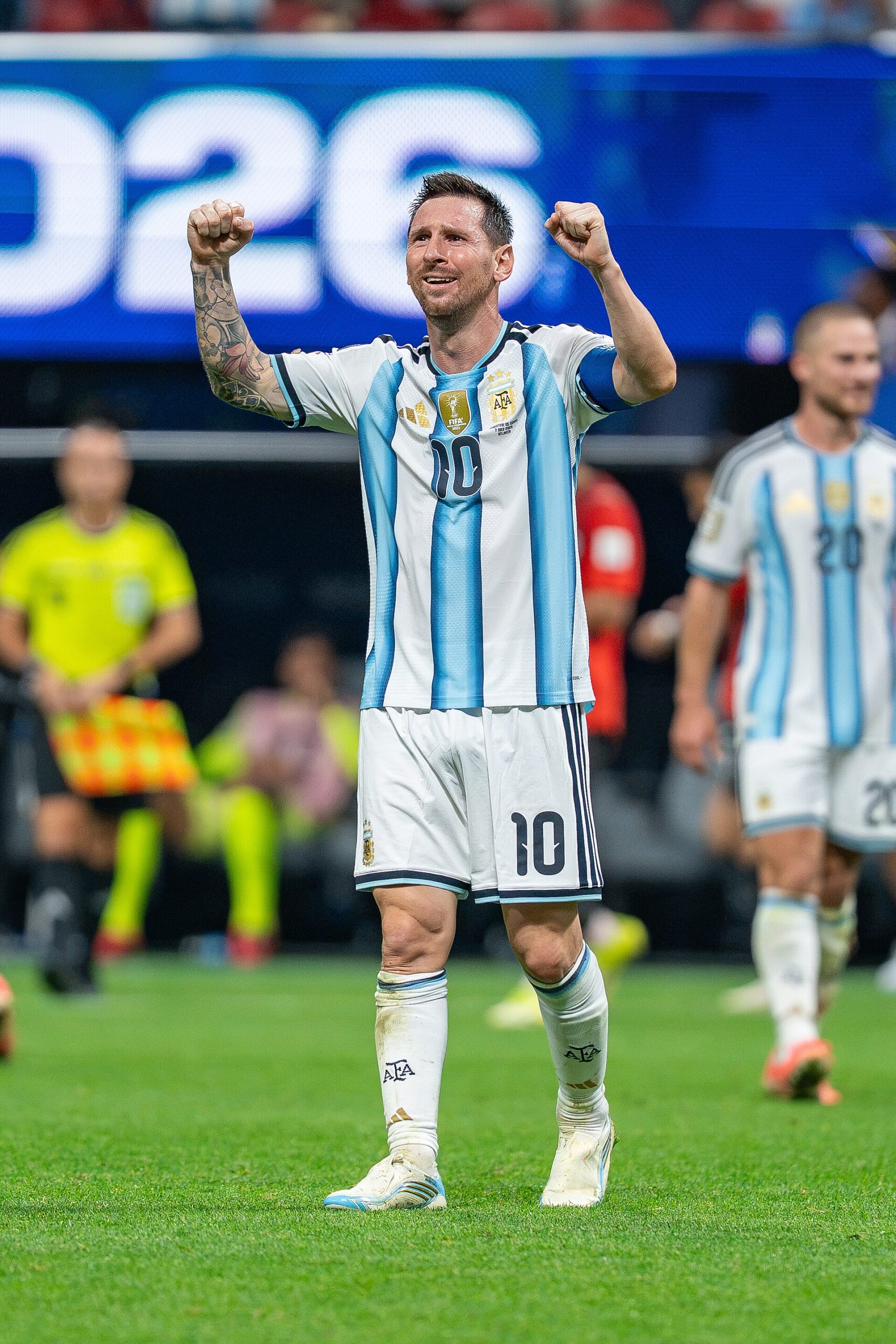 Lionel Messi celebrating in Argentina&rsquo;s blue-and-white kit
