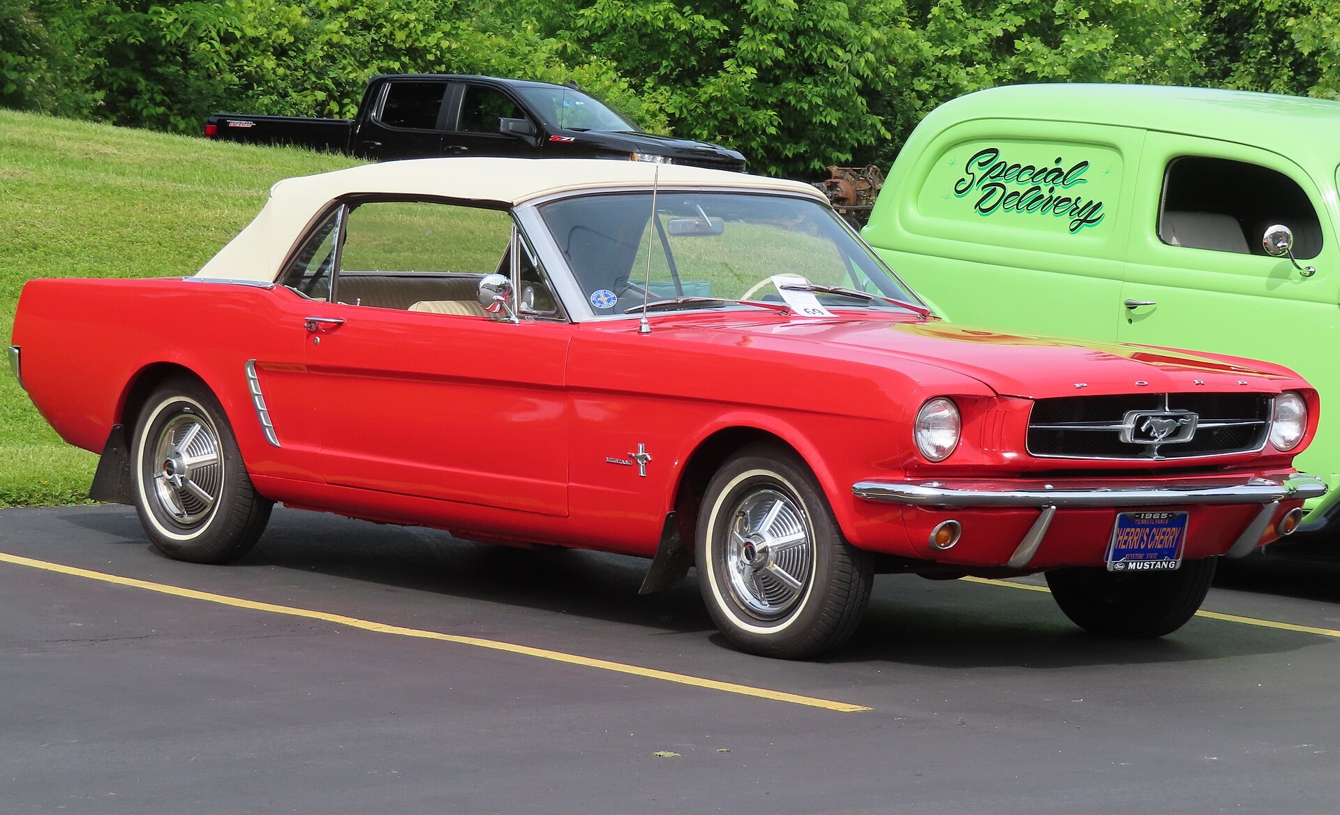 A 1965 Ford Mustang convertible parked outdoors