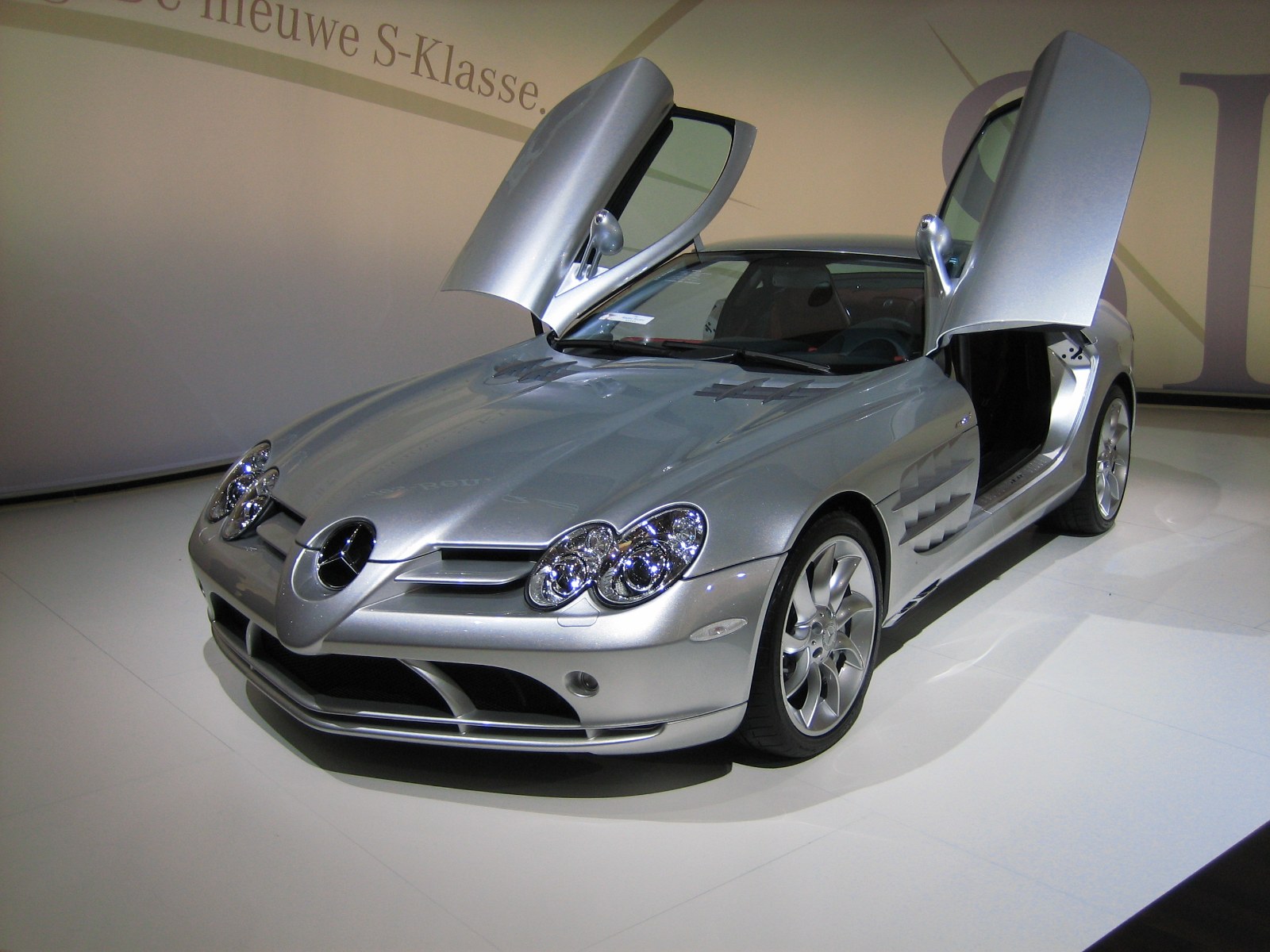 Silver Mercedes-Benz SLR McLaren with butterfly doors open