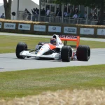 McLaren MP4/6 Formula 1 car with Marlboro-style red and white livery on track