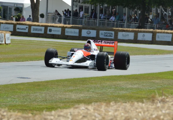 McLaren MP4/6 Formula 1 car with Marlboro-style red and white livery on track