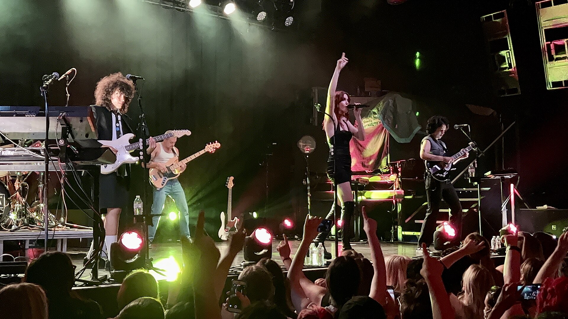 MUNA performing on stage at First Avenue in Minneapolis in 2022