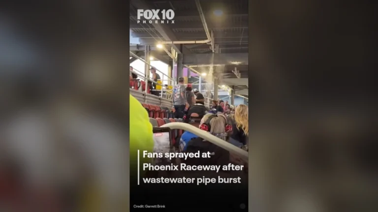 Wastewater sprays from a broken overhead pipe onto fans in the Phoenix Raceway grandstand