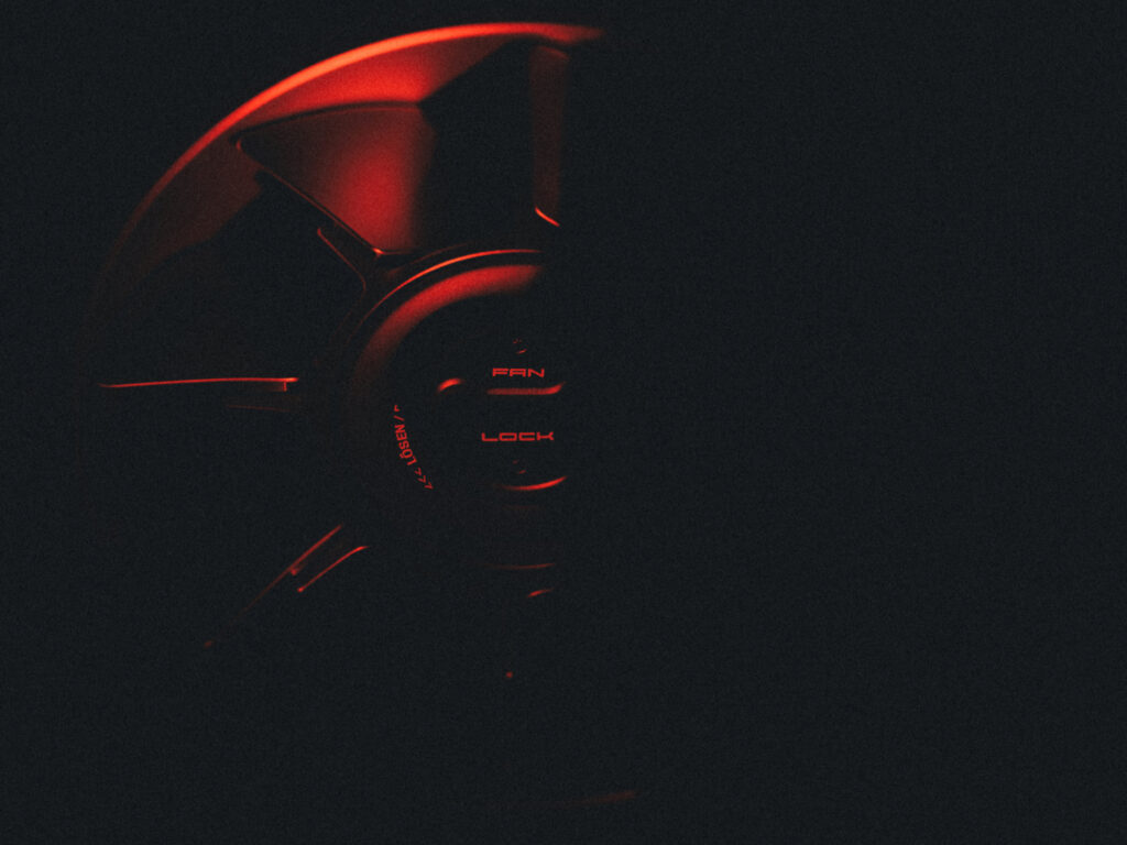 Porsche Mission S center-lock wheel teaser marked FAN and LOCK