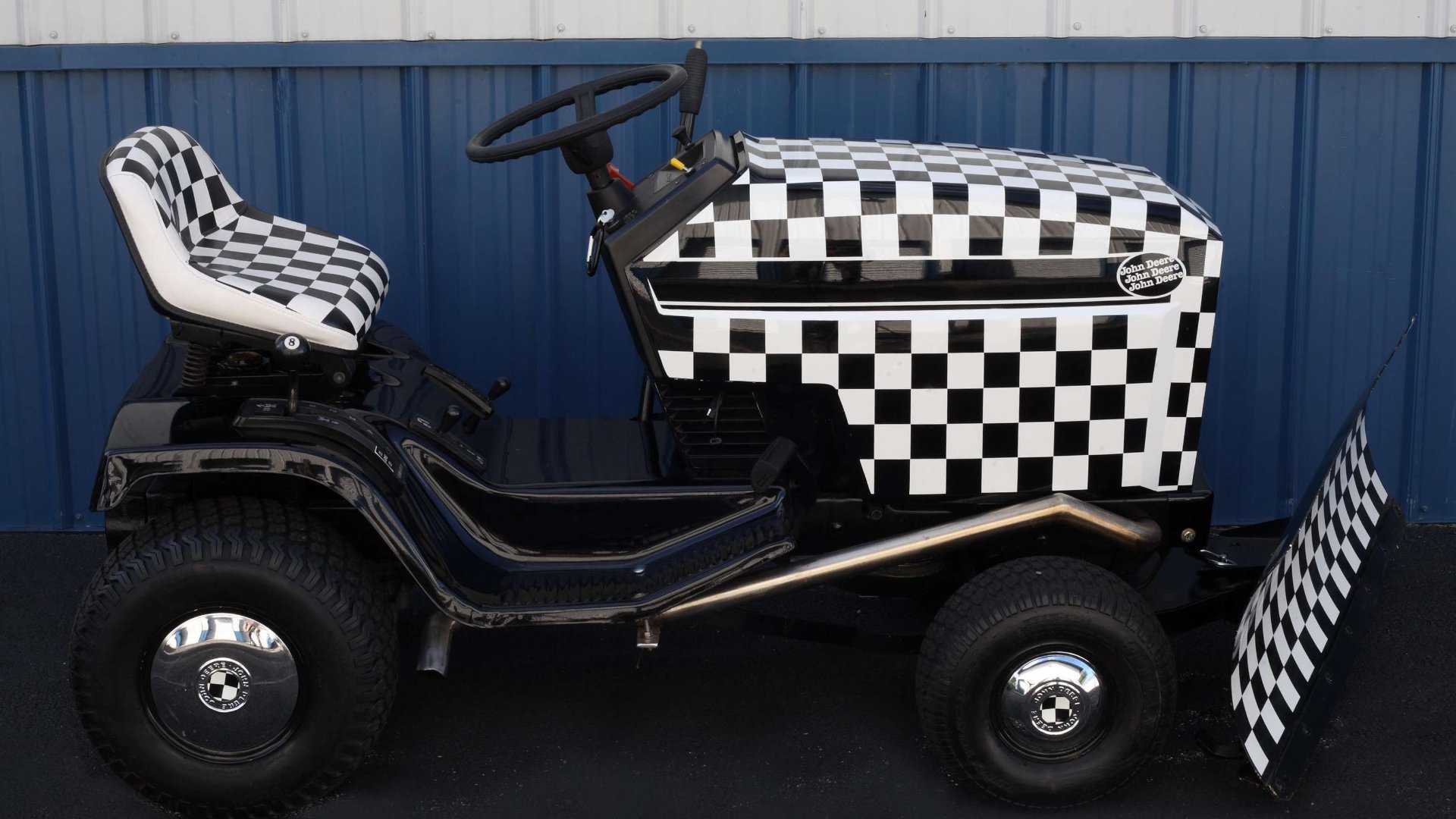 Checkerboard John Deere 170 tractor with snowplough owned by Rick Nielsen