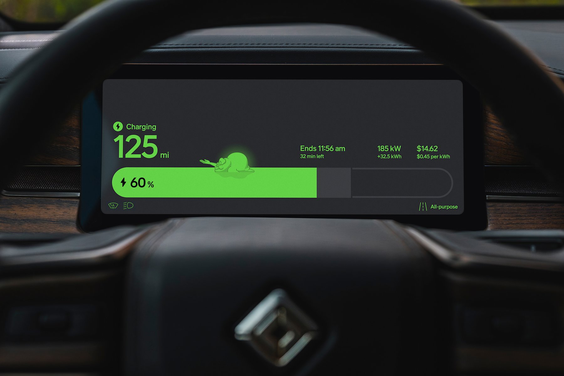 Rivian R1 driver display showing a green Ghostbusters-themed charging screen