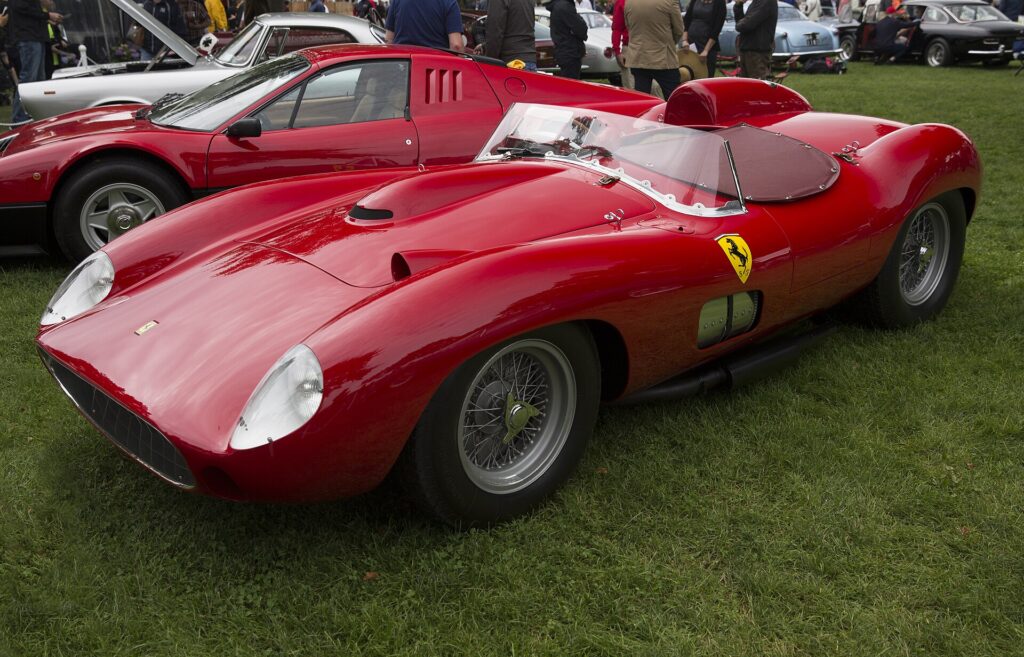 Red 1957 Ferrari 335 Sport Spider Scaglietti on a show lawn