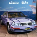 Street Fighter II bonus-stage 1994 Lexus LS400 replica in a pixelated lavender vinyl wrap