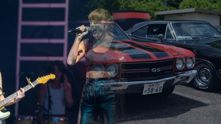 Photo illustration blending a Taylor Swift concert photo with a red 1970 Chevrolet Chevelle SS