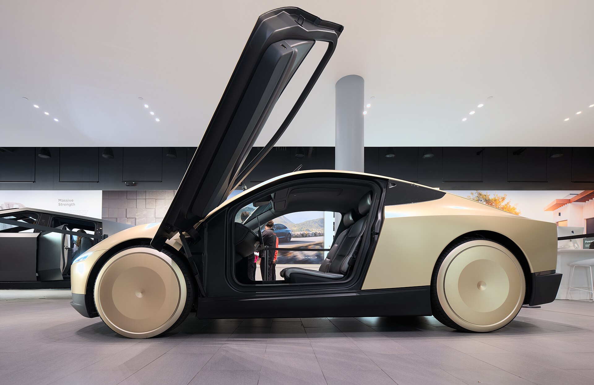 Side view of the Tesla Cybercab concept on display at Santana Row