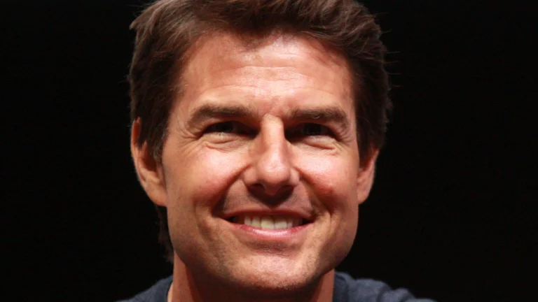 Tom Cruise smiling at a public event