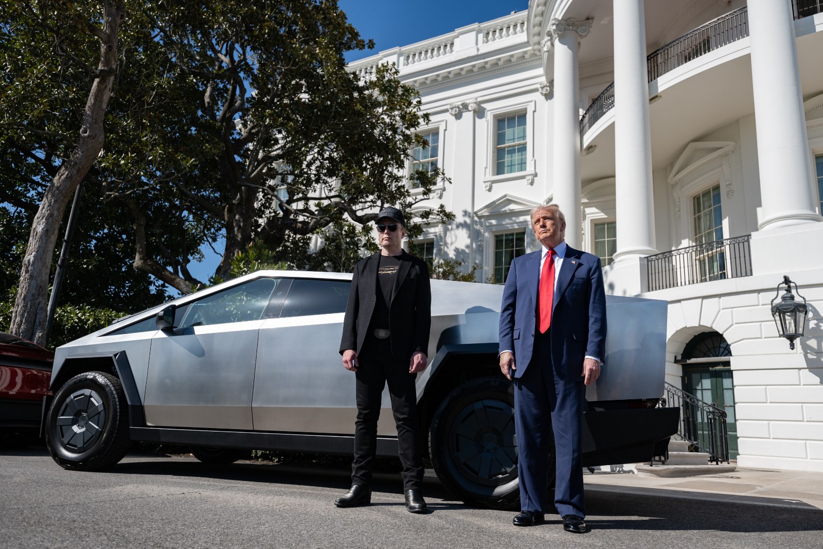 Donald Trump and Elon Musk with a Tesla Cybertruck outside the White House